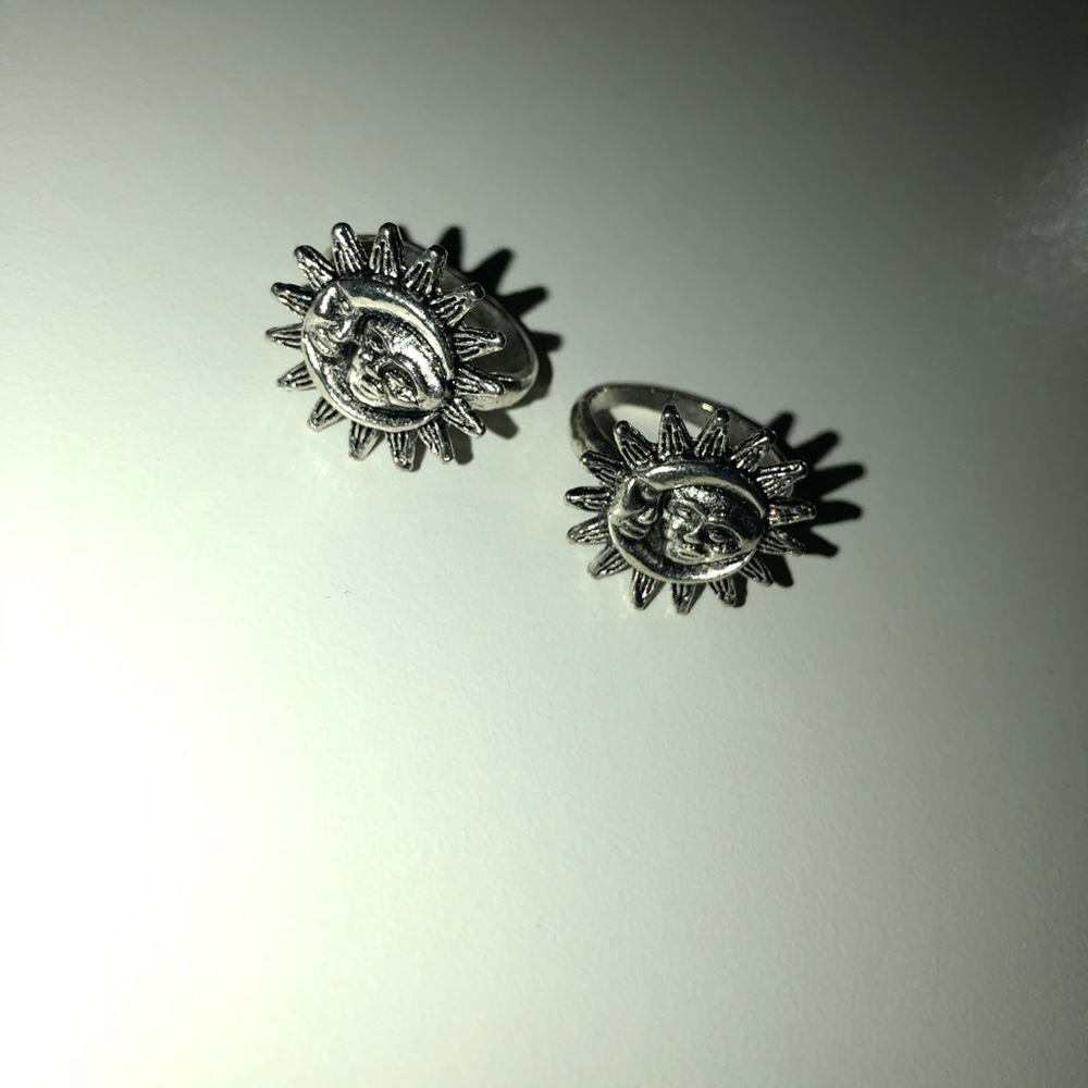 Silver moon and sun rings.